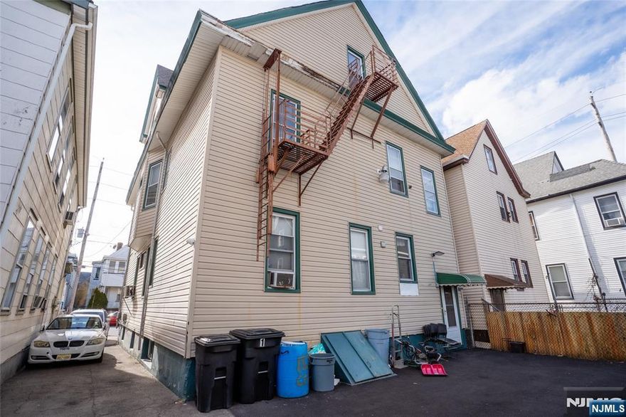 Well-maintained two-family house, offering ample space and a variety of features, perfect blend of comfort and potential for owner occupied or rental opportunities. The first floor features four bedrooms and one full bathroom. The second floor consists of three bedrooms and one full bathroom, providing privacy and comfort. Additionally, the home boasts a finished attic with a full bathroom, creating an extra living area or potential for further customization.The property also includes a two-car garage. The semi-finished basement offers further expansion opportunities, storage and more