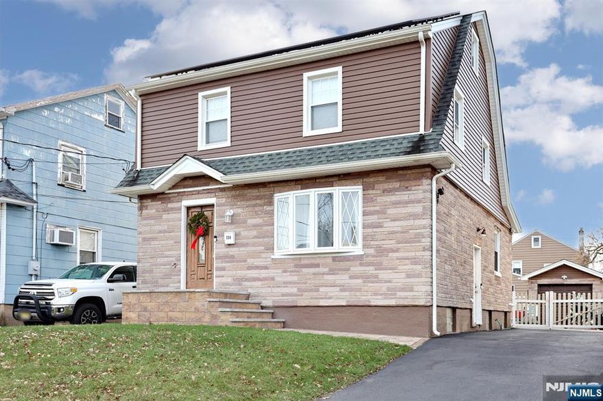 WELCOME TO 358 WINDSOR ROAD IN WOOD-RIDGE, NEW JERSEY, A BEAUTIFULLY MAINTAINED 3 BEDROOM, 1.5 BATH COLONIAL LOCATED ON A QUIET, TREE-LINED STREET. THIS HOME WAS FULLY RENOVATED IN 2021 AND OFFERS A PERFECT BLEND OF CLASSIC CHARM AND MODERN UPDATES. THE MAIN LEVEL FEATURES HARDWOOD FLOORS THROUGHOUT, A STYLISH CUSTOM KITCHEN WITH A LARGE CENTER ISLAND AND STAINLESS STEEL APPLIANCES, ALONG WITH THE CONVENIENCE OF A FIRST-FLOOR HALF BATHROOM. THE SECOND FLOOR INCLUDES THREE COMFORTABLE BEDROOMS AND A FULL BATH, PLUS A WALK-UP ATTIC PROVIDING AMPLE STORAGE SPACE. THE FINISHED BASEMENT ADDS VALUABLE LIVING AREA AND INCLUDES A SEPARATE UTILITY AND LAUNDRY ROOM. ADDITIONAL HIGHLIGHTS INCLUDE FORCED HOT AIR HEAT, CENTRAL AIR CONDITIONING, AND A DETACHED ONE-CAR GARAGE THAT CAN DOUBLE AS A MAN CAVE OR FLEX SPACE. THE LONG DRIVEWAY OFFERS PARKING FOR UP TO FOUR CARS. A MOVE-IN READY HOME IN A DESIRABLE LOCATION CLOSE TO TRANSPORTATION, SCHOOLS, AND SHOPPING.