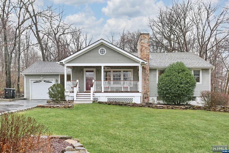 Fantastic opportunity to own this charming ranch in the Ramsey Golf and Country Club! The inviting front porch welcomes you into this lovey home that offers one-floor living space. Living room with a wood-burning fireplace and hardwood floors. Large dining room with plenty of space to enjoy nice dinners. Renovated kitchen with white cabinetry, quarts counters and stainless appliances. Sliding door to a huge deck overlooking a flat private yard. Beautiful renovated main bath. Tremendous finished basement that offers a family room with a fireplace, a full bathroom and a separate finished room that could be used as a 3rd bedroom, office or exercise area. The large property offers endless expansion possibilities! Enjoy the amenities of the RGCC which includes; Pool, Restaurant, Golf, Paddle, Pickle Ball & Social Events. Don't miss this one, it's a Gem!