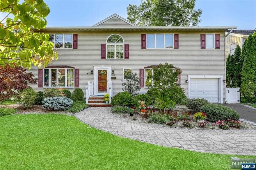 What a fabulous classic center hall colonial in very desirable Glen Rock, known for train to NYC, town pool, excellent schools and plenty of downtown fun! This four bedroom 3.5 bath has a beautifully updated kitchen with white shaker style cabinetry, subway tile backsplash, quartz countertops and SS appliances as well as a lovely breakfast room. Enjoy a large formal living room and dining room for all your entertaining needs. The cozy family room with gas fireplace, vaulted ceiling and skylights give a bright and cheerful atmosphere. A full bath and powder room complete this level. The second floor features primary bedroom w/bath, three additional bedrooms and a full bathroom. Amenities include large deck, fully finished basement with pool table included, 5 year young roof, and multi-zone heat.