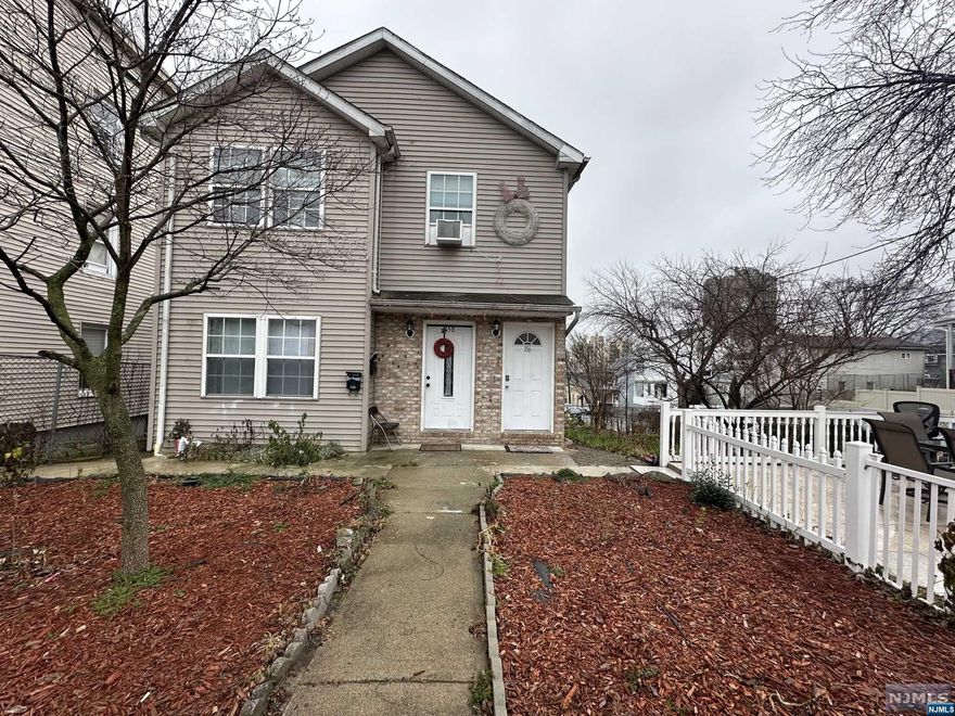 Fantastic opportunity awaits in Paterson with this versatile two-family home situated on a corner lot. Each unit boasts 3 bedrooms, a full bathroom, formal dining room, living room, a well-appointed kitchens in both, and a finished walk-out basement. The property comes complete with a generous driveway accommodating up to 6 cars, an expansive backyard . Don't miss out on the endless possibilities this property offers.