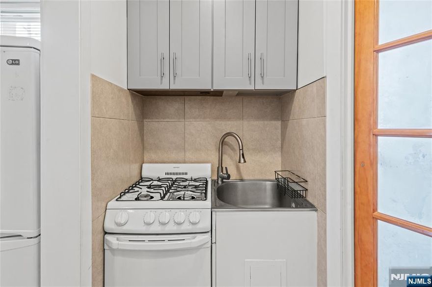 This newly renovated 2nd floor studio apartment in Carlstadt is the perfect space for anyone looking for comfort and convenience. Step inside this open concept living space where sunlight pours through the large windows, creating a bright and airy retreat. The cozy living area flows into a modern galley kitchen with new appliances, sleek countertops and ample cabinet space. The new bathroom boasts cotemporary fixtures and a clean, stylish design. Hardwood flooring in the main living area and tile in the kitchen and bathroom. Enjoy the best of both worlds with a quiet residential setting while being centrally located close to local dining, shopping and major highways. Commuting is a breeze with NYC buses and trains close by, putting you close to the city without the hassle. Shared use of yard for personal enjoyment, perfect to relax and unwind. Landlord will consider small pet. No Smoking. No laundry but the laundromat is 2 blocks away. Tenants pay for gas and electric. Storage available in the garage. Whether you're working in the city or simply enjoying the local amenities, this studio apartment is an excellent choice for your next rental! Schedule a Tour Today and make this apartment your new home!