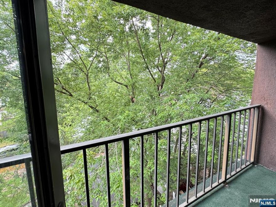 Commuterâ€™s dream! This beautifully updated 2-bedroom, 1.5-bath condo is perfectly situated in the highly desirable Fairmont section of Hackensack, just minutes from express buses, the train station, major highways, shopping, and dining. Step inside to a bright, open-concept living space featuring a modern eat-in kitchen with a sleek quartz countertop, stainless steel appliances, and ample built-in storage. The sun-drenched living room offers a cozy fireplace and opens to a private balconyâ€”perfect for relaxing or entertaining. The spacious primary bedroom includes a walk-in closet and a tastefully renovated bathroom. The second bedroom also has balcony access and is ideal for guests or a home office, with a convenient half bath just across the hall. Additional highlights include same-floor laundry, one-car garage parking, and one assigned parking. Pet-friendly (under 25 lbs). This move-in-ready home checks all the boxesâ€”donâ€™t miss it!