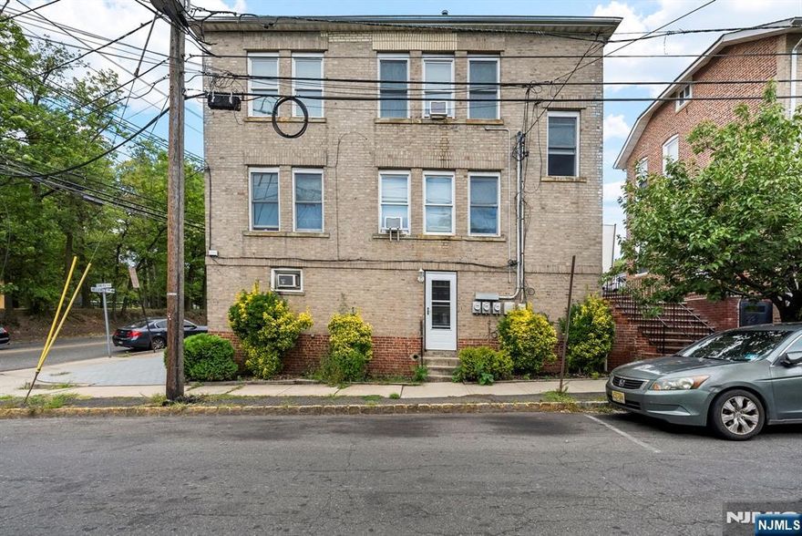 Welcome to this charming 3-unit property, offering a perfect blend of comfort and investment opportunity! Each unit provides spacious living areas, and the home includes 4 exclusive parking spaces for convenience. The versatile attic adds extra storage or potential for a creative space. Ideally located near Branch Brook Park, with easy access to public transportation to NYC and nearby highways, this property combines functionality, space, and potential in a great location. Don't miss the chance to make it yours!