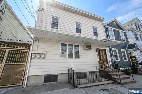 Photo of 94 Van Buren Street, Newark, NJ 07105 (MLS # 26026009)