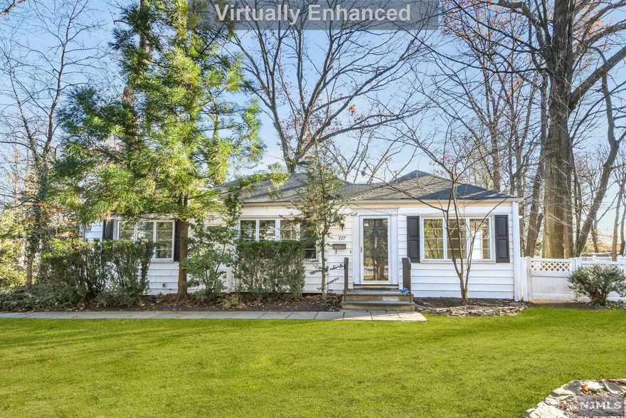 Prime Glen Rock Location, Walk to all! Perfect as is yet has endless possibilities. The large living room with hardwood floors is complemented by a wood burning fireplace and newer windows throughout. A galley kitchen overlooking the incredible backyard and dining room with sliding glass doors to yard, light and bright! The first floor is completed with 3 bedrooms (one large bedroom newly carpeted) and 1 recently renovated full bathroom. The lower level has new carpet throughout and is complete with storage and laundry room. The property includes a 2-car detached garage with potting shed and a long and wide driveway, allowing for extra parking. The backyard has a second structure with electricity and a fireplace, windows on two sides, with an extra storage shed attached. Bring your imagination!