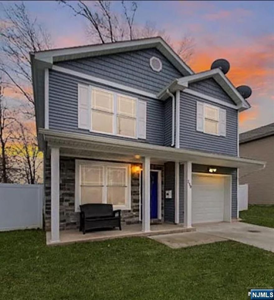 Stylish Colonial with Modern Finishes! Built in 2016, this stunning Colonial offers the perfect balance of style and comfort. The open-concept floor plan highlights a designer white kitchen with granite countertops, stainless steel appliances, under-cabinet lighting, a breakfast peninsula, and an oversized pantry. The master suite boasts a luxurious full bath and walk-in closet. Additional upgrades include hardwood flooring, a high-efficiency tankless hot water heater, forced hot air, central HVAC, and an attached 1-car garage with interior access. Step outside to a private, fully fenced backyard with maintenance-free white vinyl fencing perfect for relaxing or entertaining.