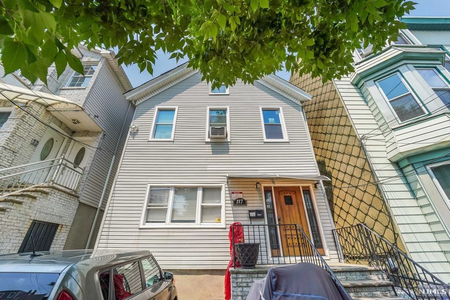 Located in the heart of Jersey City Heights, this beautiful, well-maintained two-family home with tons of space is perfect for an owner-occupant or investor. Walk into your first floor 1bdrm 1bath recently renovated unit with large kitchen and hardwood floors throughout. The second floor (currently tenant occupied) is a 2bdrm, 1 bath with additional large office/ storage room and modern kitchen. The 3rd floor features 1 full bath, family room, bedroom and kitchenette which can be an in-law or guest space. Perfect for converting into 2 duplex apartments or to fully rent for investment. The finished basement has a full bathroom and enough space to host guests etc. 1 parking space and a large yard complete this great home. Easy & quick commute to NY Port Authority, Hoboken, Downtown JC, accessible highways 1&9, Lincoln & Holland Tunnels, Rt 3 and NJ Turnpike. Enjoy all of the amenities that are available; parks, farmers markets, shopping, restaurants, schools and houses of worship.