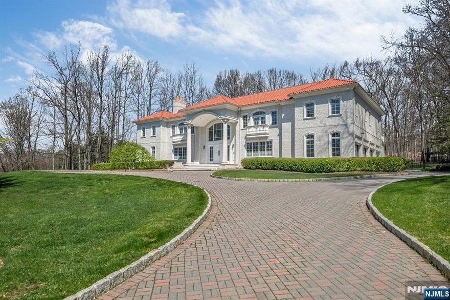 Exceptional custom estate set on one of Saddle Riverâ€™s most coveted streets, surrounded by multi-million-dollar residences. This newly renovated, all-brick European style estate is situated on 2 acres of beautifully manicured, park-like grounds. A striking double-height foyer introduces the home, flowing seamlessly into formal living and dining rooms. The spectacular great room showcases soaring ceilings and dramatic walls of glass, flooding the space with natural light and opening effortlessly to a designer chefâ€™s kitchen with an oversized center island, premium appliances, and elevated finishes. A vaulted, sunlit breakfast area offers direct access to the backyard. The primary suite is a true retreat, featuring a private balcony, custom walk-in closets, and a brand-new spa-inspired bath with a soaking tub and oversized shower. Three additional bedrooms are generously sized, each offering en-suite baths and WICs. Completely renovated throughout, the home is enhanced by designer tilework and high-end finishes, providing a clean, modern palette. Truly a cohesive and sophisticated feel. A massive unfinished basement presents exceptional space for future expansion. The exterior is equally impressive, offering a 4-car garage and a resort-style setting complete with a heated in-ground pool, spa, waterfall, and a sprawling flat backyard. Rare opportunity to own a turnkey luxury estate offering privacy, scale, and refined living in one of Bergen Countyâ€™s most prestigious zipco