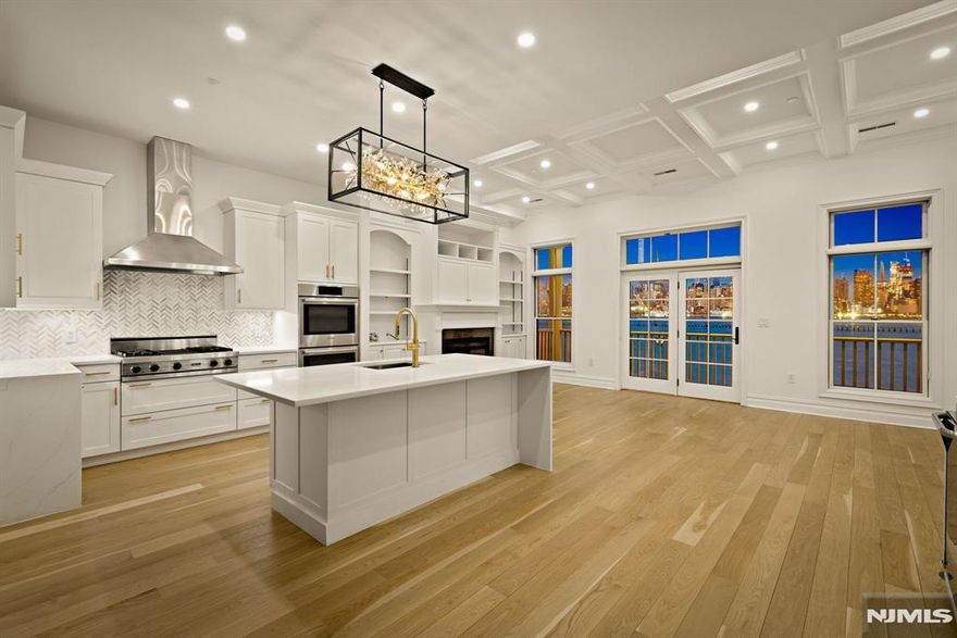 Completely reimagined from top to bottom, 16 Regency Place offers a rare blend of modern luxury and timeless sophistication. This fully renovated residence features a newly opened floor plan with stunning new flooring throughout, a designer kitchen with premium finishes, and thoughtfully curated details at every turn. Three private terraces showcase panoramic, unobstructed views of the Manhattan skyline, spanning Hudson Yards, 42nd Street, and the Empire State Building, all framed in breathtaking clarity. A grand staircase and private elevator connect all levels seamlessly, while the private garage, green lawn, and serene waterfront setting create the perfect balance of comfort, privacy, and elegance.16 Regency Place is a proud member of the Brownstones at Port Imperial, a well-respected community of luxury homes with unparalleled views of The Greatest City in the World.