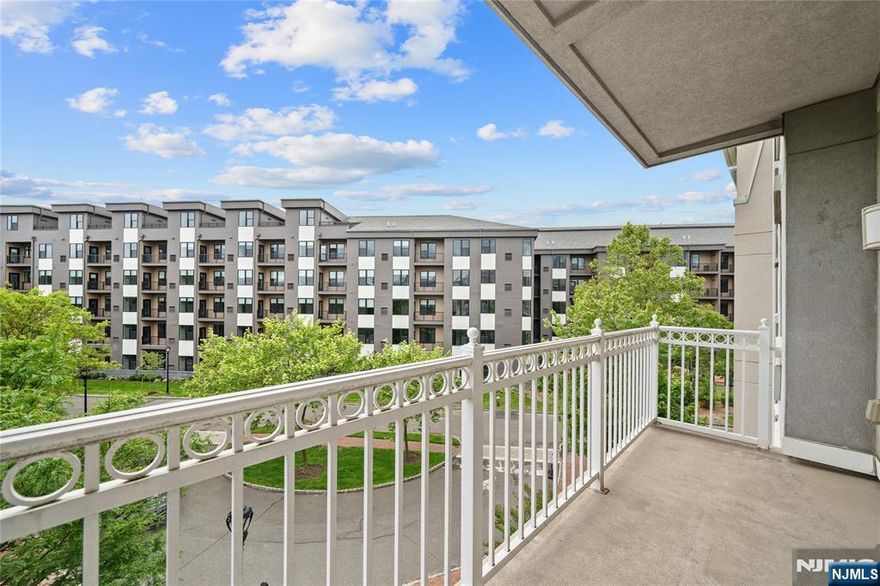 Walk right into this 786sqft 1 bedroom with a private balcony and parking spot! The open kitchen features granite countertops and stainless-steel appliances. Private balcony overlooking the courtyard. Spacious master bedroom includes a walk-in closet. Hardwood floors throughout and washer/dryer in unit. Elevator building with amenities including 24-hour security, a gym, swimming pool, tennis & basketball courts, playground, dog park, and a shuttle bus to Grove St. Path Station. Move in ASAP.