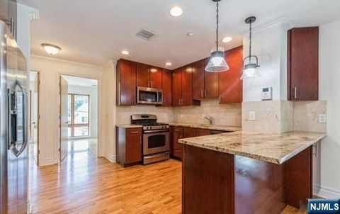 Photo of 17 Meadow Rd #210, Rutherford, NJ 07070 (MLS # 26000566)