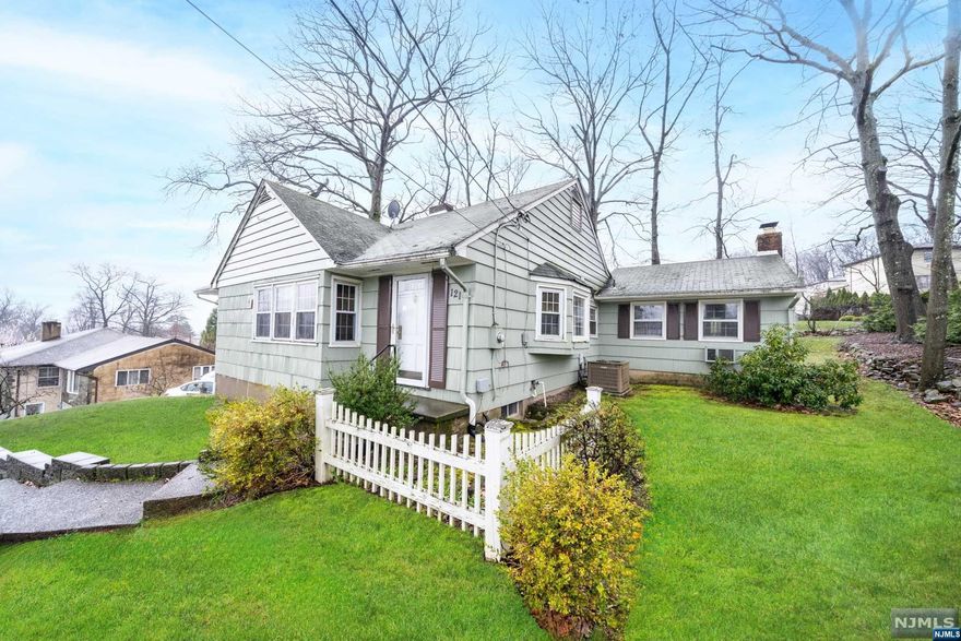 Welcome to your dream home in Wayne! This charming ranch-style abode boasts 3 bedrooms and 1.5 bathrooms, providing ample space for comfortable living. The inviting living room is adorned with a large window that floods the space with natural light, complemented by beamed ceilings, and showcases a cozy fireplace, perfect for chilly evenings. Additionally, the house features cooling central AC for added comfort during warmer seasons. A family room with a cooling wall unit provides extra comfort. Step into the recently updated kitchen, where culinary adventures await. The ground level offers additional storage, a mechanical area, laundry facilities, and a bonus room, ready for your personal touches to make it your own. Outside, a spacious backyard beckons, promising endless opportunities for outdoor entertaining and relaxation. Enjoy the convenience of an attached 2-car garage and ample driveway parking. Offers the opportunity to witness the sunrise every morning. Don't miss out!