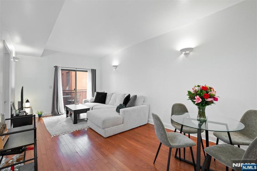 Modern Elegance & Prime Location â€“ Welcome to Unit 6K at Park Avenue Grand! This impeccably maintained 1-bed, 1-bath condo offers an open-concept layout living space with gleaming hardwood floors and a private terraceâ€”perfect for morning coffee. The well-appointed kitchen features stainless steel appliances, a gas range stove, built-in microwave, and ample cabinetry. The spacious bedroom boasts an oversized window and large closet. Enjoy modern conveniences in this elevator building with ButterflyMX security, washer/dryer on every floor, and secured garage parking. Unbeatable locationâ€”5 min to Lincoln Tunnel & NJ Turnpike, blocks from Boulevard Eastâ€™s stunning NYC views, 10 min to the light rail, ferry, shops, gyms, cafes & more. Surrounded by top-tier daycare centers, yoga studios, and must-try restaurants. More than a homeâ€”itâ€™s a lifestyle!