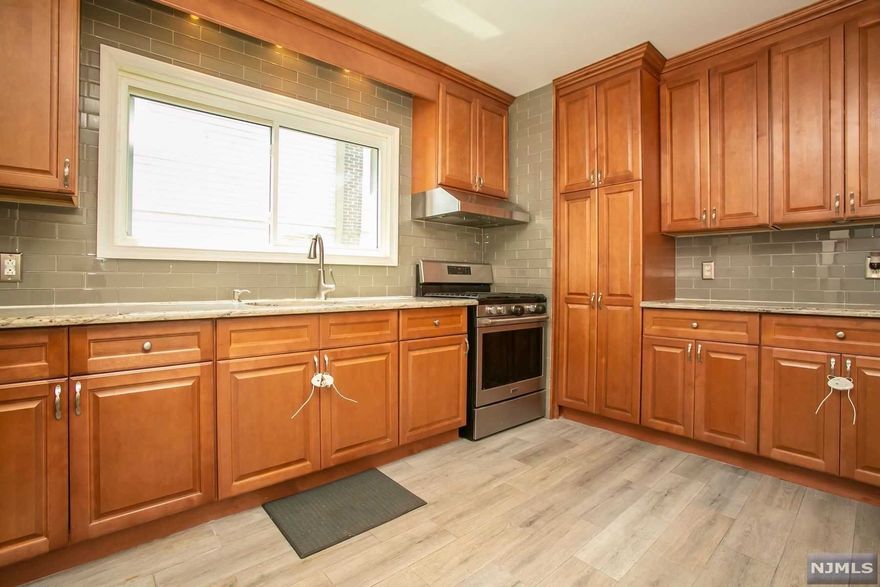 Pride in Ownership! Well maintained Ranch, 2 Bedrooms with a third option bedroom in basement. Newly Renovated eat in Kitchen with granite countertops as well as stainless steel appliances. Both bathrooms are updated. Central Air and Tankless water heating system. Front porch perfect for summer nights. Kitchenette in basement along with family room make for a basement perfect for entertaining. Detached garage with great storage space. Large backyard with above ground pool. Quite neighborhood just steps away from Belleville's Recreational House. Close to Schools and transportation.