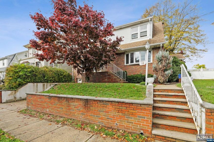 Amazing opportunity to purchase this spacious two-family home in Demarest section of Bloomfield. The home is vacant and ready for new tenants! Interior was recently painted, and hardwood floors refinished throughout. Central air and forced hot air in both units. Attached one-car garage and a sweet fenced-in yard with patio and outside space. First floor unit has three bedrooms and two baths (one bath in basement). Great closet space and nice natural light. Spacious, semi-finished basement is part of the first floor unit with tons of storage. Second floor unit includes two bedrooms, one bath. House is an estate and being sold in "as is condition. Great investment property or owner occupy.