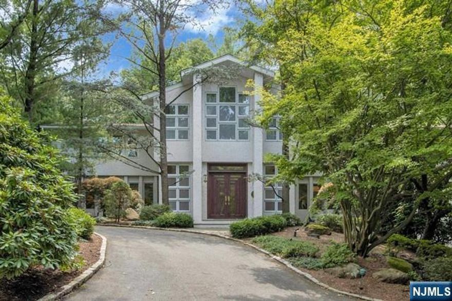 LOCATED ON THE PRESTIGIOUS EAST HILL OF CRESSKILL,THIS EXSPANSIVE 6 BEDROOM CONTEMPORARY SITUATED ON OVER AN ACRE OF BEAUTIFULLY LANDSCAPED PROPERTY WILL EXCEED YOUR HIGHEST EXPECTATIONS.THIS GRACIOUS HOME OFFERS A GRAND 2-STORY ENTRANCE FOYER & WONDERFUL OPEN FLOOR PLAN FROM ROOM TO ROOM. FORMAL LIVING RM W/CUSTOM BUILT-INS, 2-STORY GREAT RM W/FP, SPACIOUS GOURMET KITCHEN W/BREAKFAST AREA & LARGE CENTER ISLAND ARE IDEAL FOR ENTERTAINING ALL OVERLOOKING THE LUSH PARKLIKE GROUNDS WITH A GUNITE HEATED POOL. EXPANSIVE MUDRM AND SECONDARY STAIRCASE TO THE UPPER LEVEL, BEDROOM AND FULL BATH ON THE MAIN LEVEL. PRIMARY SUITE W/HIGH CEILING, BEAUTIFUL UPDATED BATH, 4 ADD'L LARGE BEDROOMS, 2 FULL BATHS AND LAUNDRY RM COMPLETE THE SECOND FLOOR. LOWER LEVEL FEATURES A REC AREA, LOUNGE, PLAY ROOM, 1/2 BATH, CEDAR CLOSET, STORAGE & 3-CAR GARAGE. FULL HOUSE GENERATOR, BLUE RIBBON SCHOOLS, JUST A SHORT DISTANCE FROM NEW YORK CITY,CLOSE TO SHOPPING, DINING, PARKS & RECREATION. NOT TO BE MISSED!