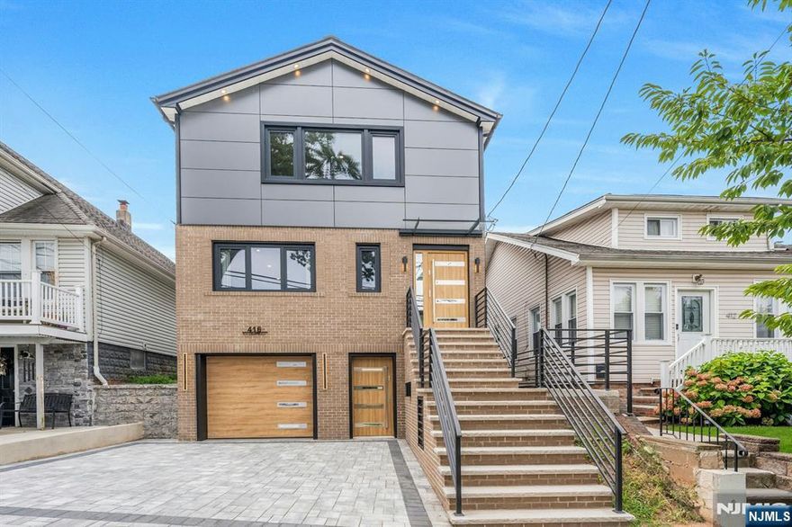 Step into this stunning new construction home where modern craftsmanship meets upscale design. this elegant 4-bedroom, 2.5-bath residence impresses with a sophisticated brick veneer exterior and premium interior finishes, statement lighting, and spa-inspired bathrooms with heated-seat technology. Enjoy two electric fireplaces-one in the living room and another in the luxurious primary suite, which also features two hidden walk-in closets behind sleek wall panels. The smart layout includes a first-floor bedroom ideal for guests or multigenerational living, a dedicated home office, and an open-concept living space anchored by a chef's kitchen with a hidden walk-in pantry .Step outside to a fully fenced backyard, perfect for privacy and entertaining. Additional highlights include a ground-level family room with walkout, built garage, and easy access to highways and public transit.