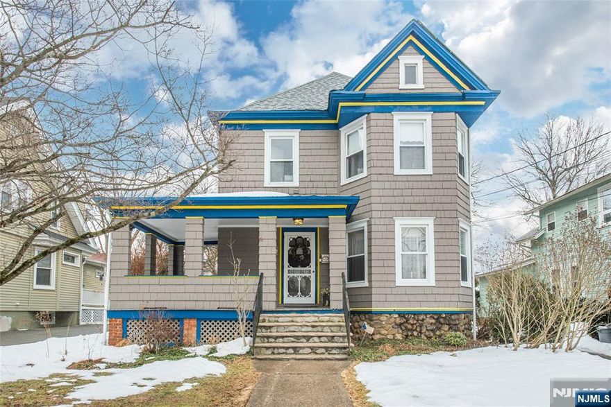 On today's episode of "This Old House" This character-filled residence is brimming with architectural charm from the stained glass window and hardwood floors to the rich moldings and thoughtful details you simply can't replicate. A welcoming wrap around front porch sets the tone, leading into a welcoming foyer and light-filled living room and a spacious dining room designed for gatherings that linger. 1st floor full bath offers convenience for guests, while the large eat-in kitchen delivers generous cabinetry, prep space and a pantry area with built-ins opening seamlessly to a rear family room addition! Upstairs you will find 5 nicely sized bedrooms. The Primary Bedroom has its own Full Bathroom! Convenient laundry room with access to walk up attic. Outside, a large deck overlooks a deep rear yard & a detached 2 car garage completes the package. Located in Lincoln School District & just a short walk from the hustle and bustle of the "Ave," Caldwell's famous & vibrant downtown with the best restaurants and pubs!