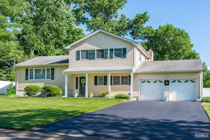 Move in ready! Beautiful 4 bedroom, 2 1/2 bath split level on a large level lot with a gorgeous gunite heated pool. The ground floor features the entry foyer which leads to the large family room which has a wood burning fireplace and sliders that lead to the beautiful backyard. Kitchen with center island, formal dining room and powder room are also on the ground level. The first floor features the spacious living room with stairs that lead up to the second level where you will find the Primary Bedroom Ensuite, 3 additional bedrooms and the main bath. The small bedroom is currently being used as an office. The door in the small bedroom leads to a walk in attic. Additional features include Kool Decking around the pool (which keeps the pool decking cool in the hot sun). Very spacious, fully fenced in yard with private vinyl fencing, front and back underground sprinkler system, 2 car garage. Beautiful neighborhood. This is a must see! Fridge in basement included