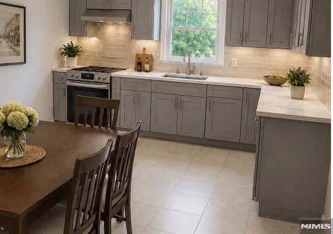 Photo of 70 Calicooneck RD #3, South Hackensack, NJ 07606 (MLS # 26031809)