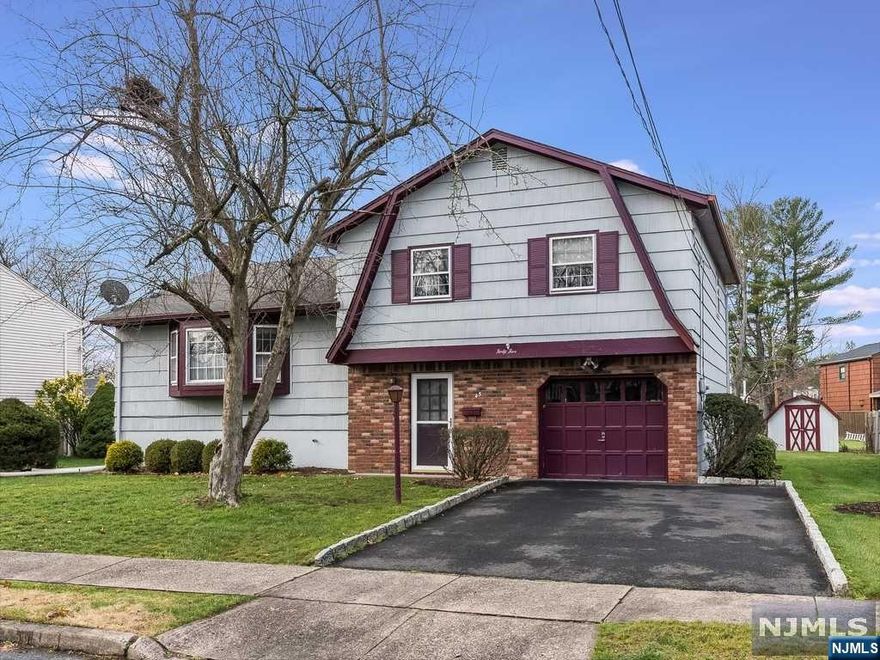 Home is where the heart is and there's no place like Home Sweet Home! Tucked away on a tree-lined street with sidewalks is a charming 3 BRM, 1 full, 1 half bath Split-Level with enormous potential and expansion possibilities, nestled on a .19-acre lot with rear patio. This home offers a wonderful park-like lot in a quiet neighborhood just minutes from Hershfield Park offering tennis courts, ball field and nature. It's conveniently located to NYC Transportation, downtown shopping, schools, Routes 23, 46, 80 and 287 . This home is being sold in as is condition so bring your vision & unearth its true potential. As you enter the ground floor foyer, there is a family room straight away with a brick fireplace, entry to the backyard and to the right is a powder room, laundry room and entry to the one car garage. A few steps up to the first floor is a large living room, dining room and eat in kitchen. The second floor offers hardwood floors under the carpet, three bedrooms and full bath.