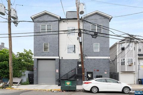 Photo of 197199 12th Avenue, Paterson, NJ 07501 (MLS # 25028238)