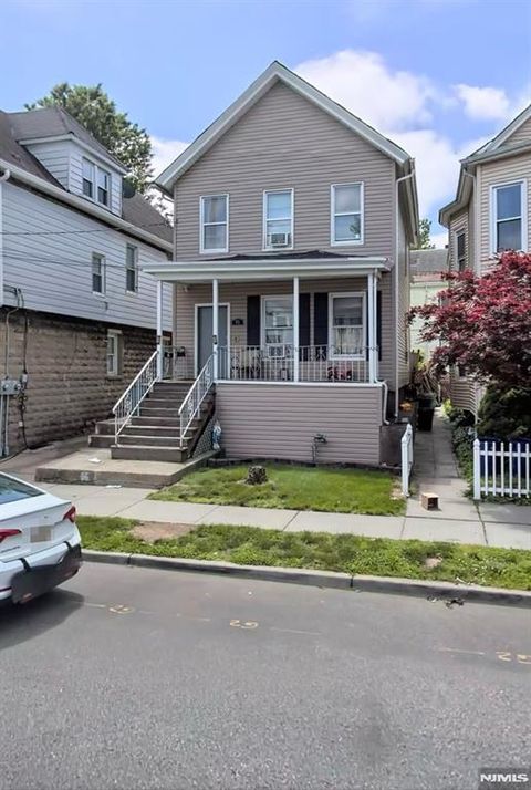 Photo of 95 Palisade Ave, Garfield, NJ 07026 (MLS # 25043312)