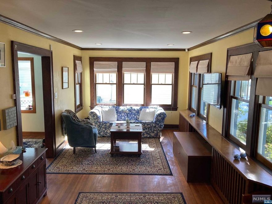 Located in the heart of Tenafly within walking distance of the Elementary, Middle and High schools. Craftsman style house lovingly updated while maintaining the original character of the home. Large living room, recently added family room 2021 with vaulted ceiling, updated kitchen (2021) that opens to the dining room, updated bathrooms (2009 and 2019). Property is oversized and park like. 3 car driveway. Basement mostly finished with rec room and office, unfinished laundry/workroom area. Large attached shed. Walk up attic with cedar closet and expansion possibilities. This home is ready for its new family to move right in.