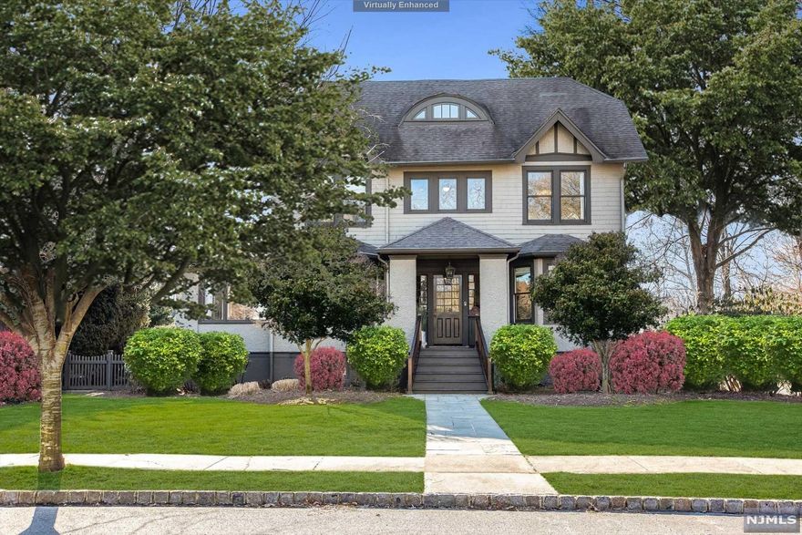 Sophisticated home w/ attention to detail. Renovations begin w/ mahogany front & back porches, fence w/ auto gate, 2-car attached garage addition w/ mahogany custom, electric doors, sprinkler system & rose, peony & hydrangea gardens. Inside custom finishes incl inset cabinetry, moldings, designer cut carpet, wallpaper & window treatments. Chef's kitchen w/ Aga range, Fisher Paykel & Bosch dishwashers, lg refrigerator, wet bar w/ wine fridge, travertine tile flr, granite counters, wood island, built in desk & pantry. Kitchen open to breakfast room/den, lg living rm w/ inset, beveled TV over custom fireplace w/ Calcutta gold marble & coffered ceiling, din rm, lg den & bonus rm addition w/ cathedral, beamed ceiling & mudrm. Basement w/ a 1k bottle wine cellar, gym, spa-like bth, laundry. The primary bth is pure elegance w/ Carrera marble, soaking tub & steam shower. Close to top-rated schools, train/bus, Walnut St shops, cafes & Farmer's Market.