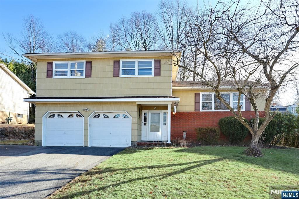 Photo of 18 Schirra Drive, Wanaque, NJ 07465 (MLS # 25044037)