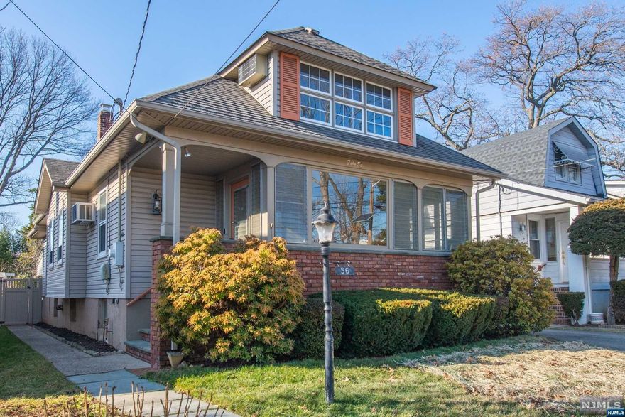 This beautiful and charming American Craftsman style Colonial is what you've been waiting for! The welcoming and inviting front porch will lead you into this well maintained home. The main floor boasts the Living Room, Formal Dining Room, Eat in Kitchen, beautifully updated Full Bathroom and a 1st floor bedroom. Second floor with new carpeting has two spacious bedrooms and a loft area with plenty of storage. Don't miss the finished basement family room, the laundry and the storage rooms. A covered patio, fenced in yard and detached garage completes this wonderful home. Hawthorne allows the peace of a smaller town while close enough to enjoy all that NYC has to offer. Wonderful neighborhood school, breathtaking views of the skyline, beautiful parks....Hawthorne, a wonderful place to work, live and play!