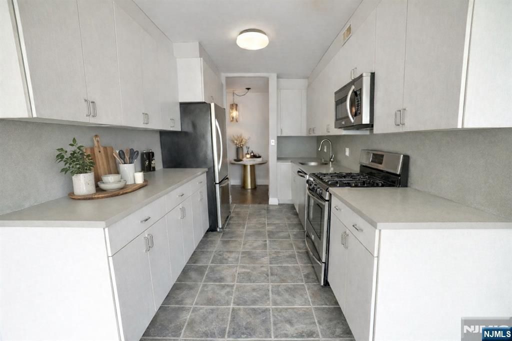 Photo of 5 Horizon Road #203, Fort Lee, NJ 07024 (MLS # 25044079)