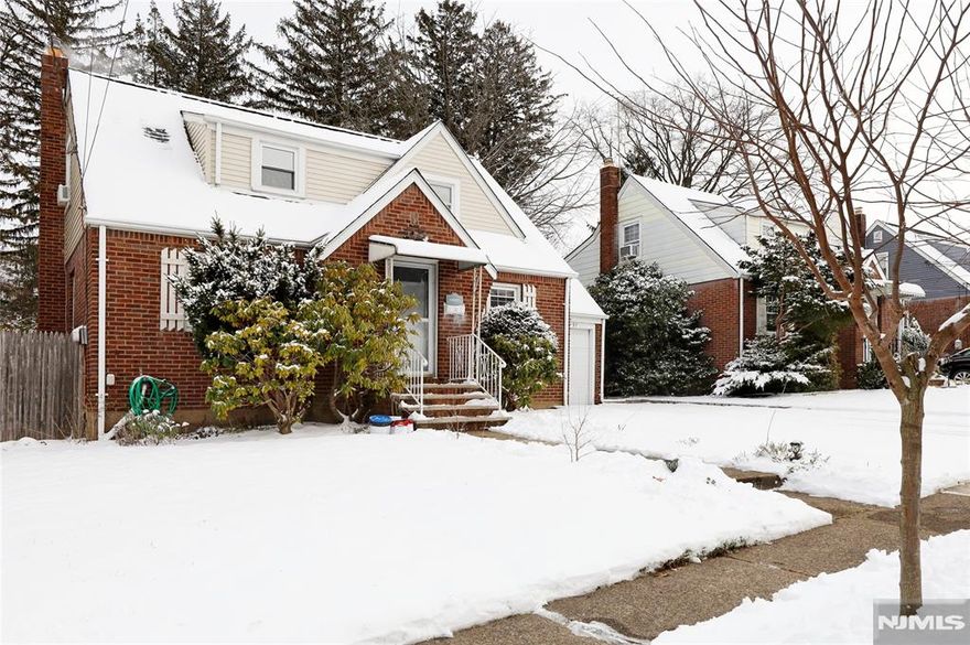Beautifully maintained brick Cape Cod in a prime location. This freshly painted 4bed, 1.5 bath home sits close to public transportation, shopping, and schools. The first floor features a bright living room, an updated U-shaped kitchen with a dining area, and direct access to the rear patio and fully fenced-in backyard, two generous-size bedrooms, and a renovated full bath complete the main level. The second floor offers two additional bedrooms with great versatility. Hardwood floors run throughout the home. A fully finished basement provides valuable extra living space and includes a convenient powder room. Ready to move right in!