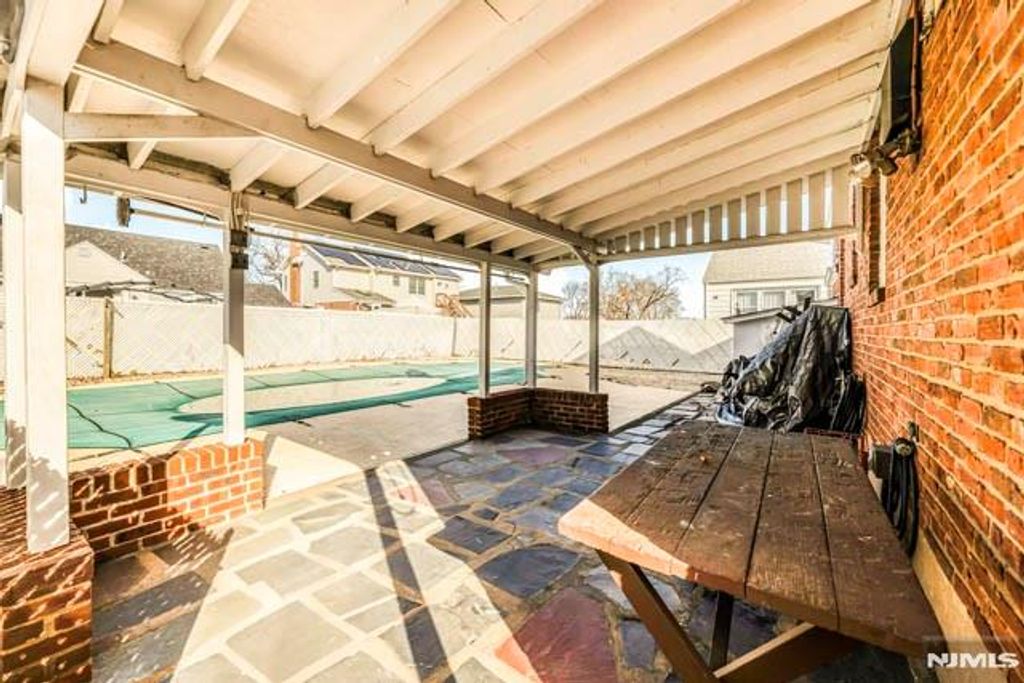 Photo of 91 Birchwood Drive, Elmwood Park, NJ 07407 (MLS # 25042539)