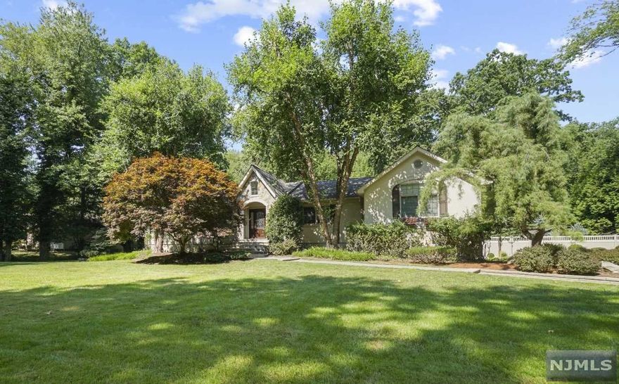 Enjoy effortless entertaining & convenient 1-fl living in this updated Ranch w/ resort-like backyard in the heart of WCL. Flooded w/ nat'l light, you'll feel at home in the warm & inviting spaces. The Great Rm w/ vaulted ceiling, cozy stone fplc & wet bar is open to the EIK ft/ SS appliances, lg ctr island & oversized breakfast area. Both spaces ft/ glass doors to the yard for seamless indoor/outdoor living. A formal LR & DR provide even more versatile space in the front of the home. An impressive 4 BRs, 2 full BAs & PR round out the main lvl- incl. an expansive Primary w/ spa-like ensuite BA. Downstairs, the fin. LL offers tons of space incl. Gym, Lounge w/wet bar & fplc, Laundry Rm, BR/Office flex space, 1/2 BA & tons of storage. Designed for lg scale entertaining, the backyard oasis is the jewel of the home. A bluestone patio w/ built-in BBQ area leads down to the sparkling pool w/ lg patio, cabana & privacy trees. New roof, gutters & skylights in 2022. You won't want to leave!