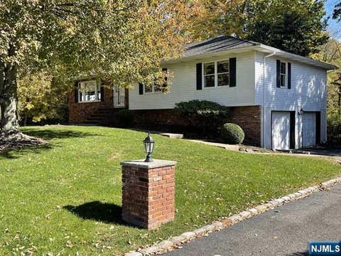 Photo of 101 S Colonial Drive, Harrington Park, NJ 07640 (MLS # 26023514)