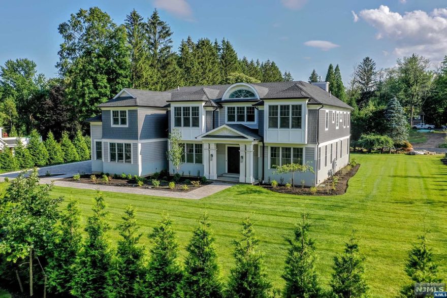 MOVE RIGHT IN! THIS SPECTACULAR NEW CONTRUCTION IS COMPLETELY FINISHED & READY FOR OCCUPANCY! ZAMPOLIN DESIGNED BY JEANNOT ESTATES,THE TAYLOR HOUSE AT HENNION RIDGE BOASTS 7 ENSUITE BRS, 7FBS/2 HALF BTHS, SOARING 2 STY FOYER W/BARREL CEILING & GRAND CNTR STAIRCASE, OPEN FLOOR PLAN, FRONT & BACK STAIRCASE, HUGE BUTLER'S PANTRY W/SINK, STUNNNING GOURMET KITCHEN W/DBL ISLAND, TOP-OF-LINE APPLIANCES, OPEN TO FAM RM W/FPL, 1ST FL GUEST STE, GRAND FDR, FLR & LIBRARY. LUX PRIMARY BR SUITE W/ENTRY GALLERY,FPL,TRAY CEILING,2 HUGE CUSTOM WALK-IN CLOSETS & SPA-LIKE PRIMARY BATH W/RADIANT HEAT. FULLY FIN LOWER LEVEL W/WET BAR/BILLARD RM/REC RM, TIERED THEATER, EXERCISE RM,PR & ADDL BR SUITE W/FB. 10 FT CEILING ON 3 FLRS, 4 CAR GARAGE, GENERATOR, SECURITY/CAMERAS. OPTION TO ADD POOL/SPA FOR PERFECT RETREAT! AWARD WINNING SCHOOLS. EASY ACCESS TO HWYS, SHOPPING OR RECREATION. OVER 7200 SQ FT 1ST/2ND FL + OVER 3300 SQ FT IN LL TOTALING 10,500+ SQ FT. 10 YR NJ BUILDER WARRANTY. A DREAM COME TRUE!