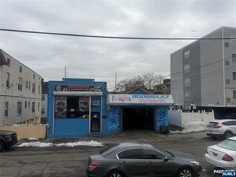 Photo of 57 8th Avenue, Passaic, NJ 07055 (MLS # 26005824)