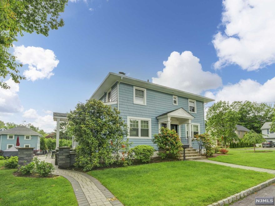 There are few boxes this home does not check! Spacious corner lot, one block away from NYC transportation/the center of town, property taxes under $10,000, highly ranked school system, 2-car detached garage with finished loft above perfect for either a work from home set up or a sports room, custom European inspired kitchen design, professionally designed outdoor entertainment space with built-in bbq and paver stone, professional landscape design, less than 5 year old heating and cooling system, updated bathrooms, finished basement. The pictures speak for themselves! This home truly is a drop your bags and just move right in!