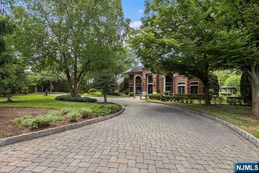 Call Puja Directly at 201 921 8945 *Watch the comprehensive virtual tour video!* https://njproper.com/mls-550-summit An Unmatched Luxury Oasis Just Minutes from Manhattan Welcome to one of Englewood Cliffsâ€™ most prestigious gated estates â€” a rare sanctuary that effortlessly combines privacy, elegance, and prime location. Set on approx. 1.3 acres of beautifully landscaped grounds, this exceptional legacy property stands as one of the largest residential lots in the area. Perfectly located near elite private schools like Dwight, scenic hiking trails, and the lively downtown district, this exclusive estate offers the best of both worlds: peaceful, park-like surroundings just minutes from the energy of New York City. This 12,214-square-foot home features 6 bedrooms, 7 full bathrooms, and 2 half baths, thoughtfully designed for multigenerational living and refined entertaining. The interior boasts a sun-drenched solarium perfect for high tea or quiet mornings, a richly finished library, a private office, and a fully finished lower level with limitless potential. Step outside to enjoy stone walkways, a storybook gazebo, and lush, tranquil gardens that complete the retreat-like ambiance. With low property taxes and a location in one of New Jerseyâ€™s most coveted zip codes, this is a rare opportunity to own a one-of-a-kind estate that truly elevates suburban living. The virtual tour has video, floor plans, 3d model & more