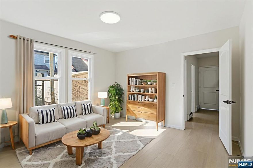 Two-family home with separate utilities, offering a great opportunity for both living and investment. The first unit includes 2 bedrooms and 1 full bath, while the second unit features 3 bedrooms and 2 full baths. Both units provide comfortable layouts with bright interiors and spacious living areas. The property also includes a backyard for added outdoor space.