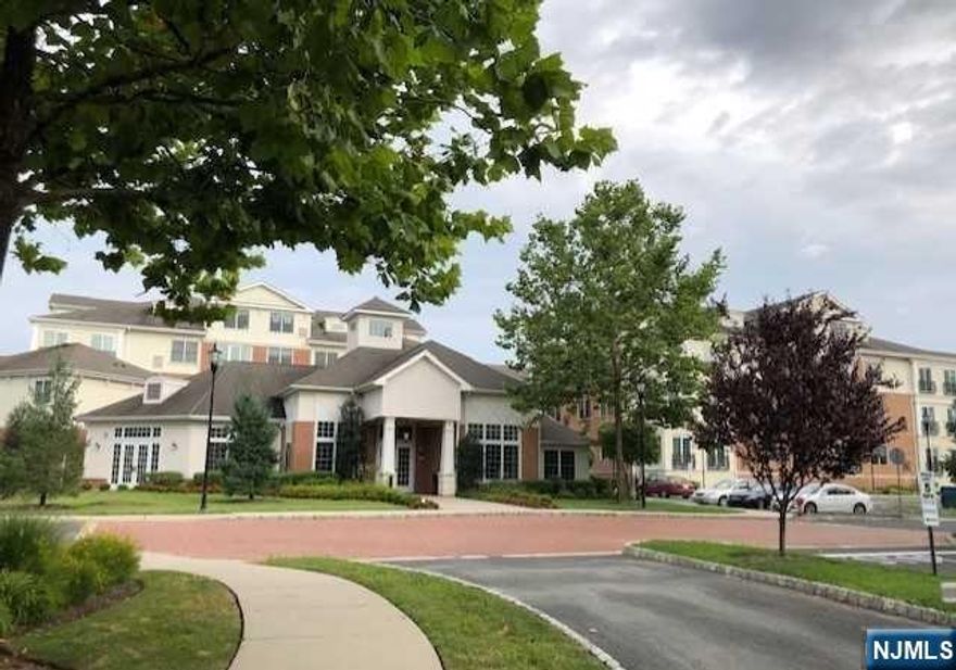 MOST BEAUTIFUL UNIT LIKE BRAND NEW WITH MANY UPGRADES. BRIGHT END UNIT OPEN VIEW. COUNTRY CLUB STYLE CONDO LOCATED IN A 24HR GATED COMMUNITY CLOSE TO NYC TRANSPORTATION, SCHOOLS AND SHOPPING. LARGE LIVING ROOM, GOURMET KITCHEN STAINLESS STEEL APPLIANCES & GRANITE COUNTER TOPS. MASTER BEDROOM W/ WALK-IN-CLOSET, MASTER BATH, 2ND LARGE BEDROOM WITH ABUNDANT CLOSET SPACE, FULL BATHROOM. 10 FT. CEILINGS, FLOOR TO CEILING WINDOWS, WASHER AND DRYER IN THE UNIT. GLEAMING HARDWOOD FLOORS THROUGHOUT. RESERVED GARAGE SPACE W/GARAGE OPENER PLUS OUTDOOR PARKING SPACE, PLENTY OF GUEST PARKING. CLUBHOUSE WITH STATE-OF -THE ART FITNESS CENTER. MEDIA/THEATER ENTERTAINMENT ROOM, BILLIARDS AREA, BUSINESS CENTER AND OUTDOOR POOL AND BBQ AREA. CONVENIENT LOCATION CLOSE TO TOWN AND NY/NJ TRANSPORTATION.