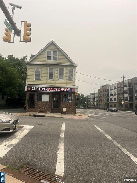 Photo of 673 Clifton Ave, Clifton, NJ 07011 (MLS # 26026863)