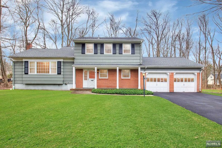 Welcome to Beechtree Estates, a quiet and highly sought after section of the West Essex Area. Situated on a prime lot, this home prides itself on having one owner through its history. This house offers a fantastic floor plan, beautiful backyard and new driveway ready to be made into the next owners dream house. Greeted by the spacious foyer with access to the living room, family room or den. Family room has a view of the expansive backyard. Formal living room is large & amazing for entertaining. Laundry room is on the ground level, which would make a wonderful mud room due to its location off of the garage. Kitchen and dining room bud up against each other. Second floor is home to four spacious bedrooms & two full baths. Vision, imagination or explore possibilities to make this your own personal masterpiece. Roseland features a highly rated school system and is in close proximity to major highways, shopping centers, and Roseland downtown.