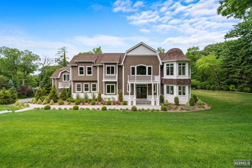 This beautiful new construction Farmhouse Colonial home 7000 +/- SF offering 6 BRs, 5Full BTHs & 1 Half BTHs with a 3 car garage is set on nearly .7 Acre on Englewood's East Hill w/ beautiful western views. Step into Perfection w/ the 2-Story Foyer, blending elegance w/ modern finishing. 1st Fl 10' Ceilings & Stunning Gourmet Kitchen feature a Magnificent 12' Island with quartz countertops and walk in pantry is open to the Glorious Family Room with deck, 28'x16' Dining RM w/ Wet Bar. Second floor Master Suite designed for comfort featuring a loft & Gorgeous Master bath with soaking tub. Four additional bedrooms with all baths ensuite, bonus room and laundry complete this floor. Approved for an in ground pool. Close to houses of worship, downtown, shopping and just 6 miles from NYC .See the video and 3D tour under Virtual Tour. This home is a must see!