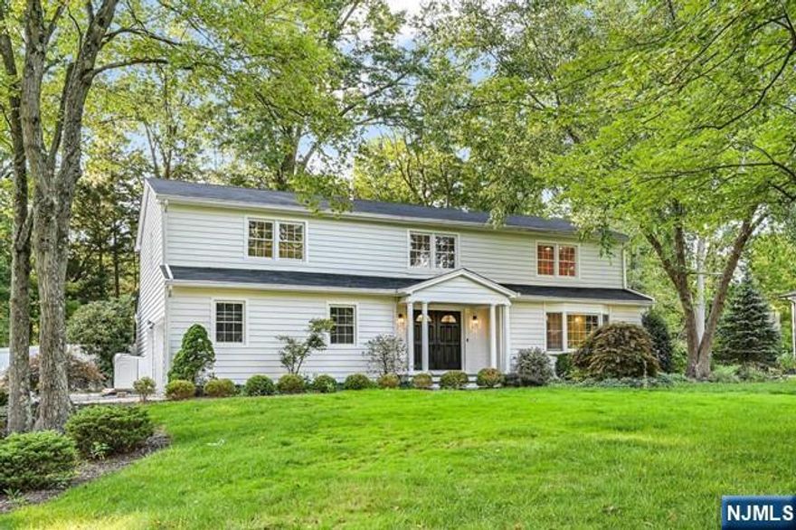 Welcome to this beautiful, completely renovated 6 BD, 5.5 BA Colonial home located in the desirable Burnet Hill section of Livingston, perfectly situated on a fenced in, flat 0.62 ACRE lot. The 1st fl greets you with a charming foyer leading to a spacious LR featuring a bay window & an electric fp. The 1st fl continues with a DR & a large eat-in kitchen equipped with stainless steel appliances and a central island, both with sliders that open onto a deck overlooking the expansive backyard ideal for entertaining & outdoor activities. A versatile BD on this level includes an en-suite bath & patio access. A convenient powder room & a 2-car garage complete the main level. Upstairs, you'll find 5 BD & 3 BA, including a luxurious primary en suite with dual walk-in closets. A convenient laundry completes this level.The finished basement offers additional living space with a rec room & a full BA. Located conveniently with access to NYC bus, hospitals & close to highly ranked Schools.