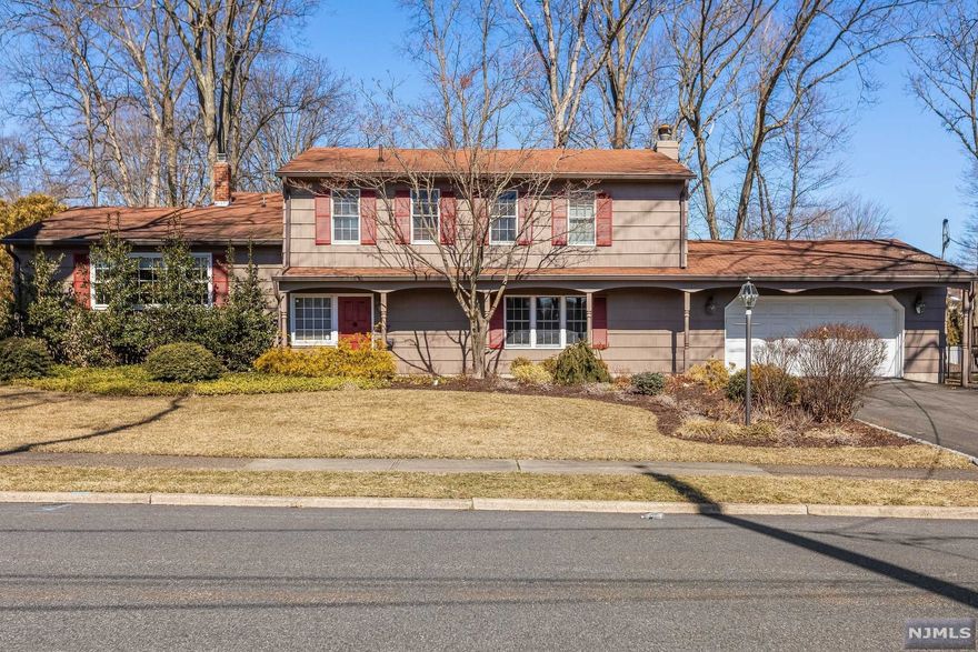 Impressive, Move in Ready, Over-sized Custom Home on a Quiet, Tree Lined Street! Great for Easy Entertaining, Expanded Family Room Features a Stone WB Fireplace w/Custom Built-ins, Additional Room to Gather Near the Wine Bar and Slider to Patio Create Perfect Flow to Fabulous Backyard. Updated Gourmet Kitchen, Granite Countertops, SS Appliances, Oversized Formal Dining Room, Living Room w/Bay Window and High Ceiling. The VERSATILE FLOOR PLAN IS IDEAL FOR WORKING FROM HOME W/PRIVATE OFFICE, Custom Built-in Desks, Cabinet Storage & Side Entrance or/5th Bedroom. LUXURIOUS PRIME BEDROOM VAULTED CEILING, HUGE WALK-IN CLOSET/DRESSING ROOM and Updated Full Bath. 3 Additional Bedrooms Share Updated Hallway Bath w/Custom Cabinetry & Marble Top. Newly Refinished Basement, 2-Car Oversized Garage. Special Features include: Wood Floors, Recessed Lighting, Custom Closets, Newer Interior Doors, Nest Thermostats/Door Bell, 2 Zone A/C, BEAUTIFUL LARGE FLAT PRIVATE YARD. Close To Shopping.