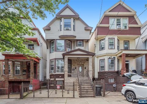 Photo of 320 Clifton Avenue, Newark, NJ 07104 (MLS # 25037615)