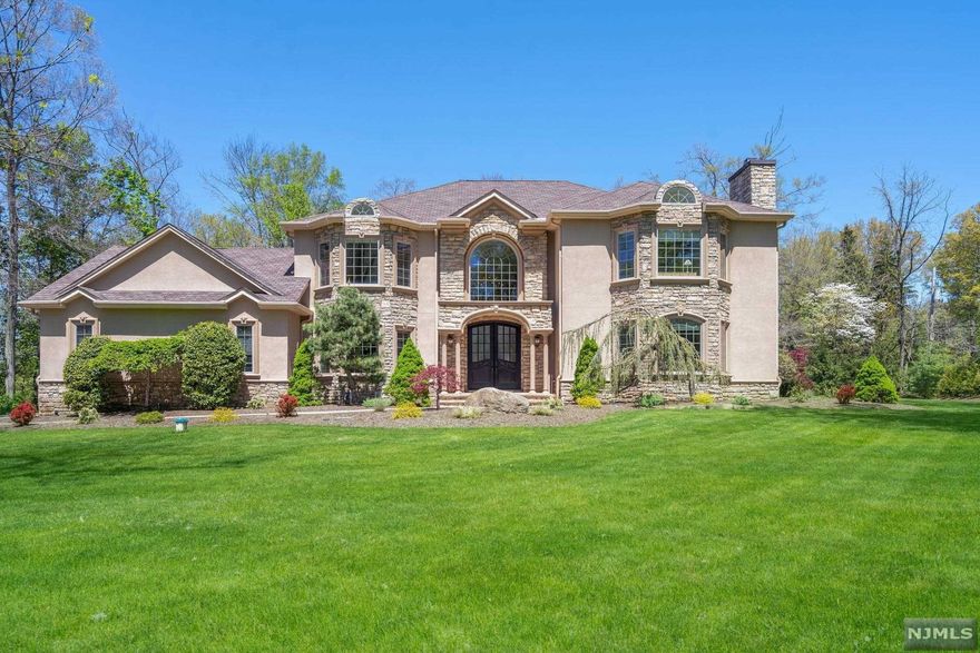 PRISTINE Elegant Colonial Manor home set majestically on a quiet block in coveted East Hill. Young architectural masterpiece showcasing 6000+ sq.ft. of LUX living resting on its own private oasis of .93 acres. Exuding divine elegance with incredible details, impressive 5+ bedroom, 3.5 bath home has all you need & more for the ultimate staycation! OPEN entertaining floorpln, dramatic 2 stry entry, sun-filled windows, custom millwork, 9' ceilings, hardwd floors, radiant floor htg, designer kitchen w/granite & TOP SS applcs, Center Isl, banquet sized dining and gracious living room with Study, main level office/bedrm, PR, grand great rm w/frplc and dbl French doors to entertaining patio. Upper lvl LUX Primary Ste w/WOW spa bath, dressing rm, custom WIC. Four addit'l bedrms, one w/bonus office/tv rm and sumptious hall bath. Private flat rear yard with lush landscape, terrace & patio. 3 car heated garage. Free bussing to all TOP 3 schools at your doorstep! Stunning South facing home!